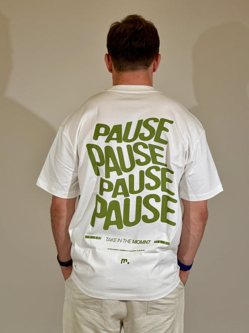 Back of white limited edition Pause t-shirt with green warped PAUSE print